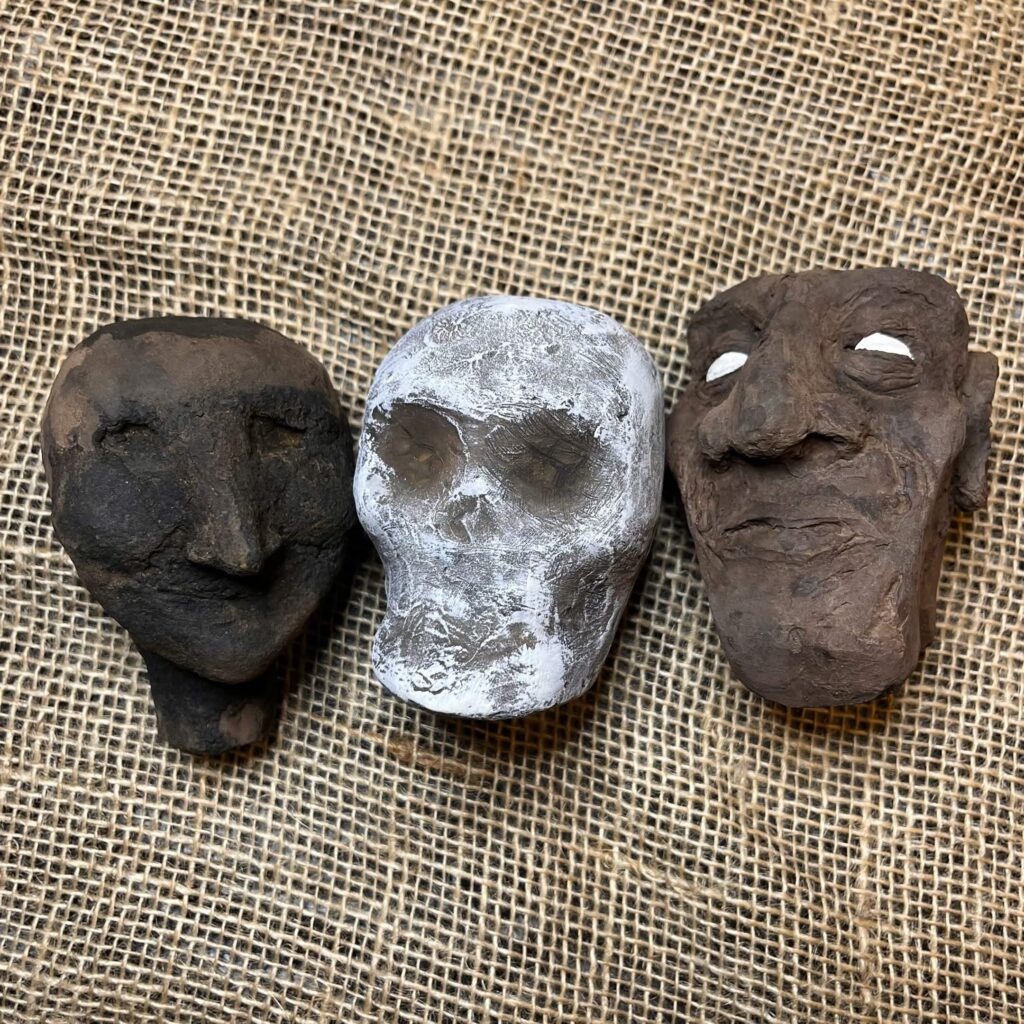 3 puppet heads, stained and painted with highlights